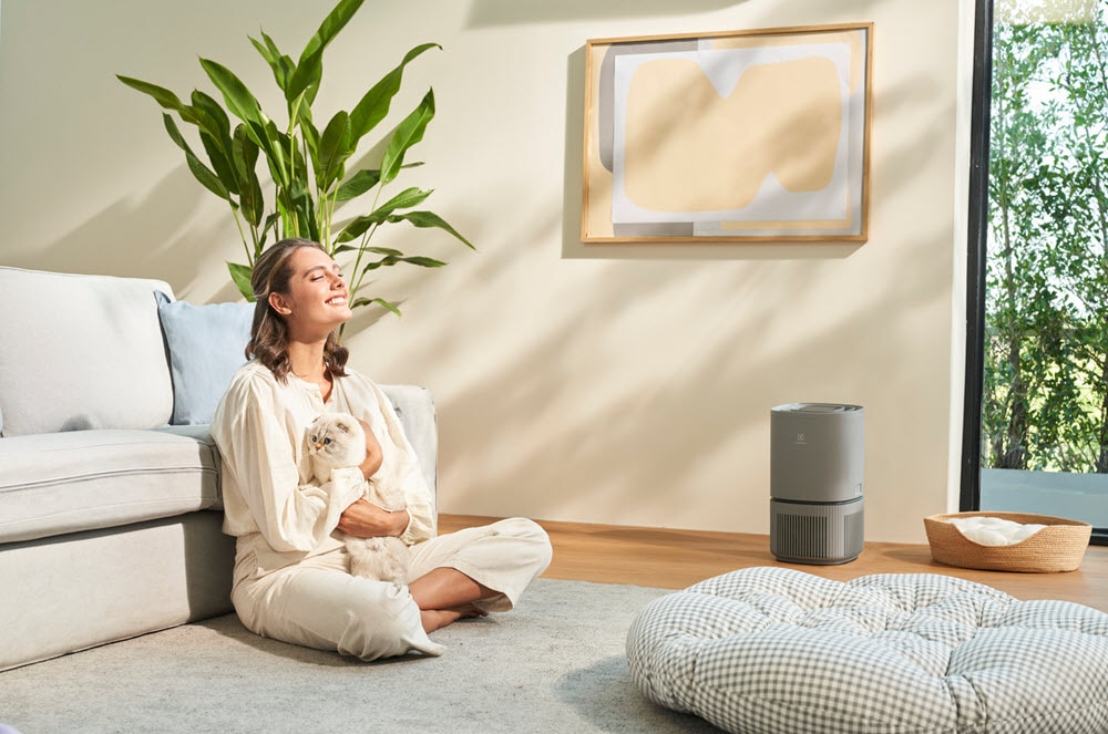 A woman enjoying clean indoor air